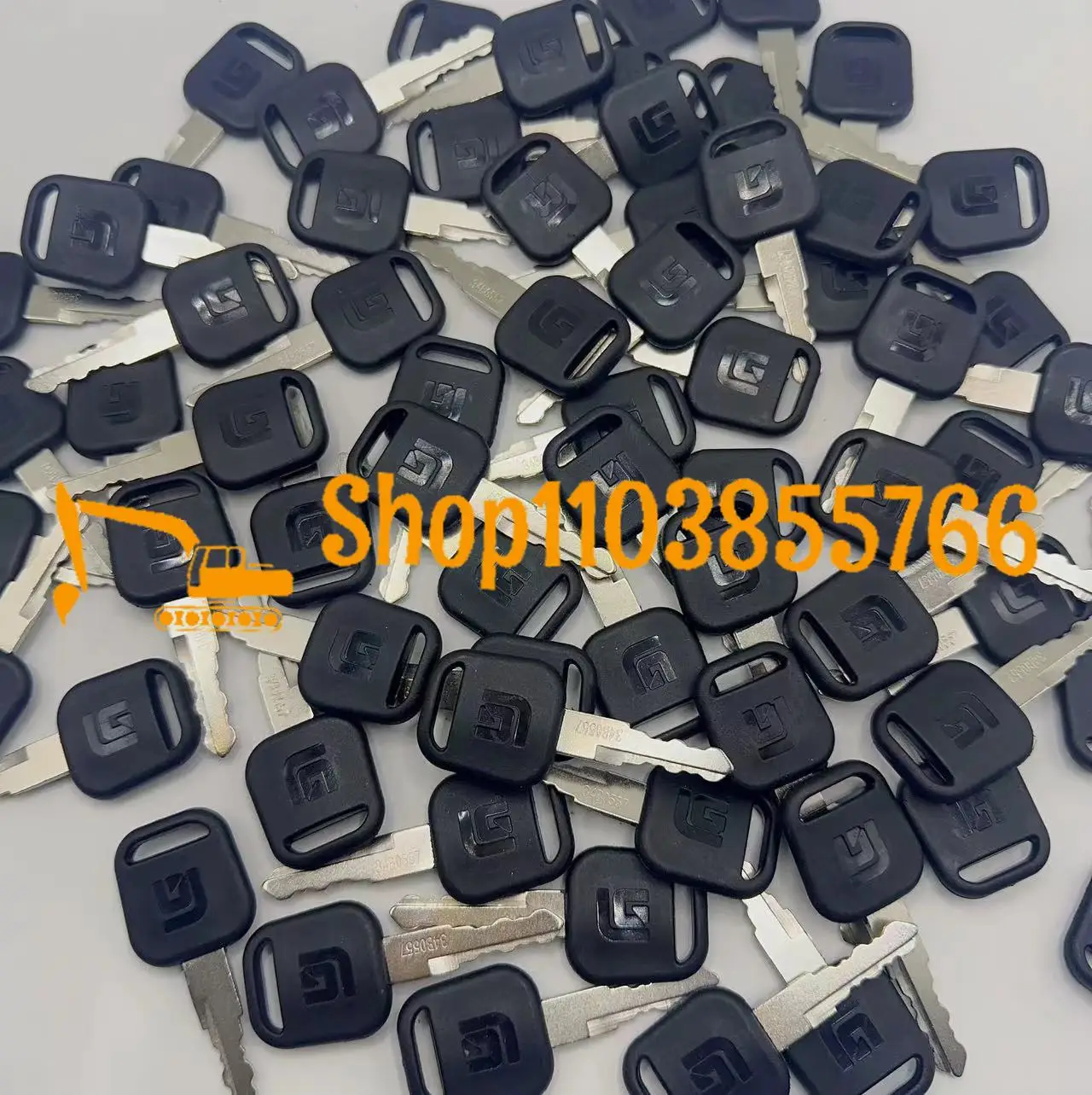 2PCS New 34B0557 Key with Bott - огляд і ціна Heavy Equipment Keychain